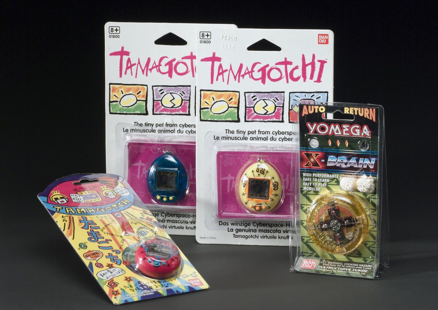 Electronic toys by Bandai (Tamagotchi cyber pets, 1996; Yomega X-Brain auto return yo-yo, 1998)