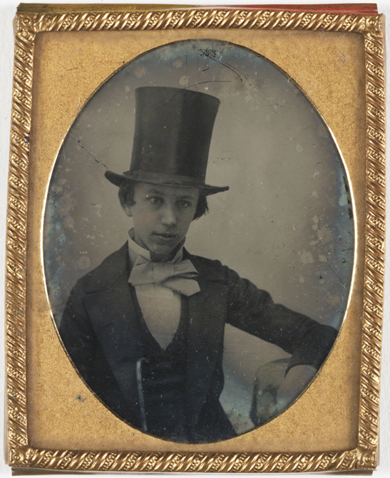 Boy wearing a top hat ambrotype, c. 1858