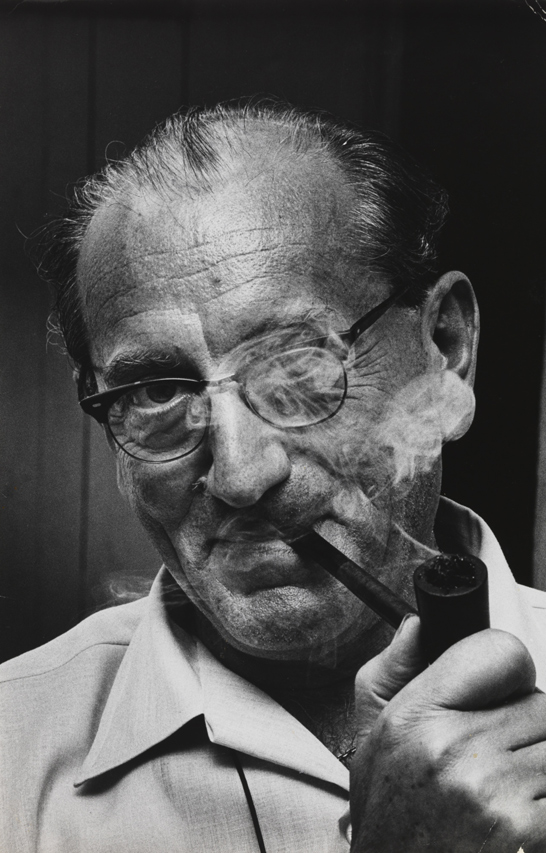 Portrait of Andor Kraszna-Krausz smoking a pipe, c.1970, National Media Museum Collection / SSPL