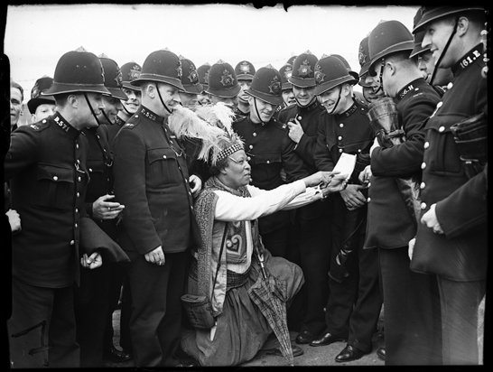 Prince Monolulu and policemen, 1 June 1938, Edward George Malindine, Daily Herald Archive, National Media Museum