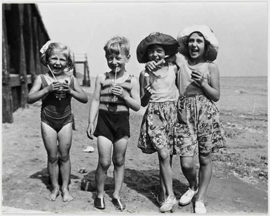 Four children on a beach, c. 1935, National Media Museum Collection