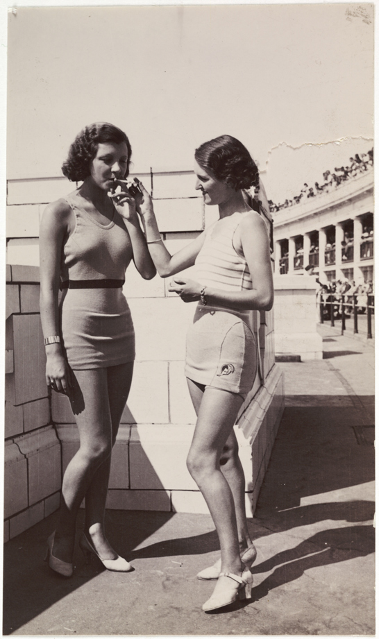 Lighting a cigarette, c. 1930, National Media Museum Collection