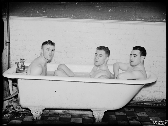 Everton footballers in the bath after training, 1938, George W Roper © Daily Herald / National Media Museum, Bradford / SSPL