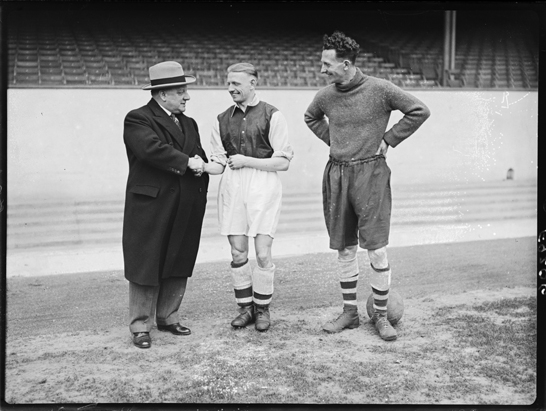 Arsenal pay £9000 for player George Drury, 1938, Harold Tomlin © Daily Herald / National Media Museum, Bradford / SSPL A photograph of Arsenal Football Club Manager, George Allison and centre half, Herbie Roberts, greeting George Drury at his arrival at Arsenal's ground Highbury. Drury was signed from Sheffield Wednesday for £9000. 
