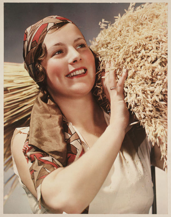 Woman carrying wheatsheaf, c. 1935, Sun Studio Ltd © National Media Museum, Bradford / SSPL. Creative Commons BY-NC-SA