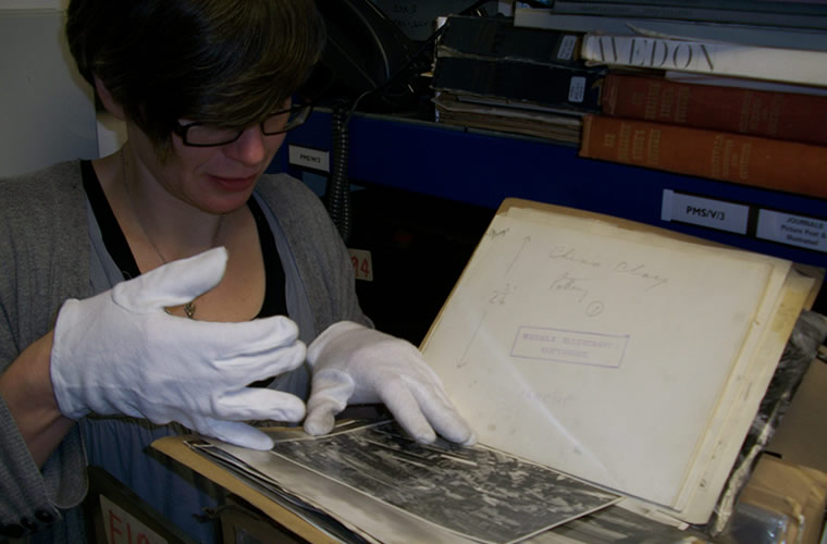 Fiona Philip with a 'Potteries' folder in the Daily Herald Archive