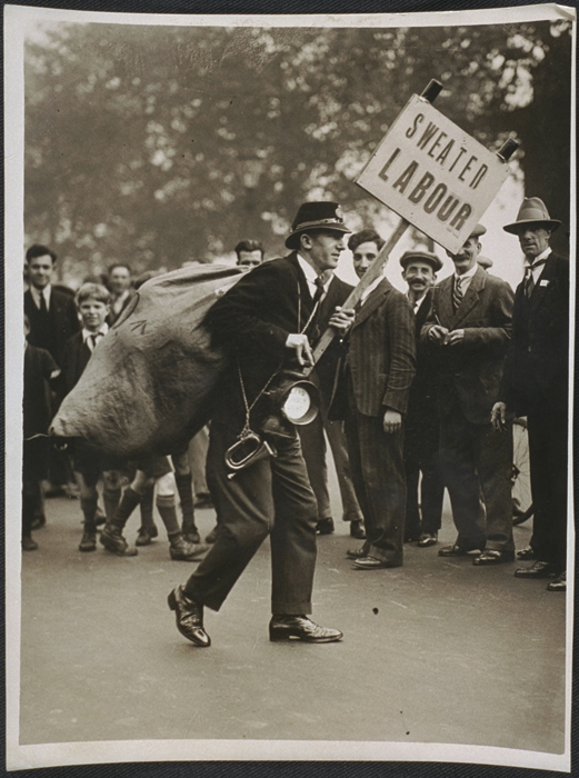 Man with 'sweated labour' placard at civil service demonstration, c. 1939. Daily Herald Archive / National Science and Media Museum Collection / SSPL