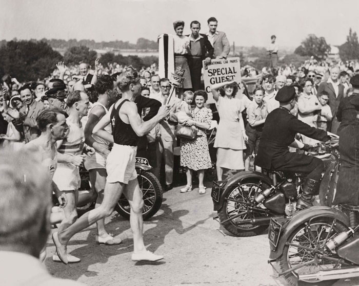 Olympic torch arrives at Wembley Stadium, London, 1948