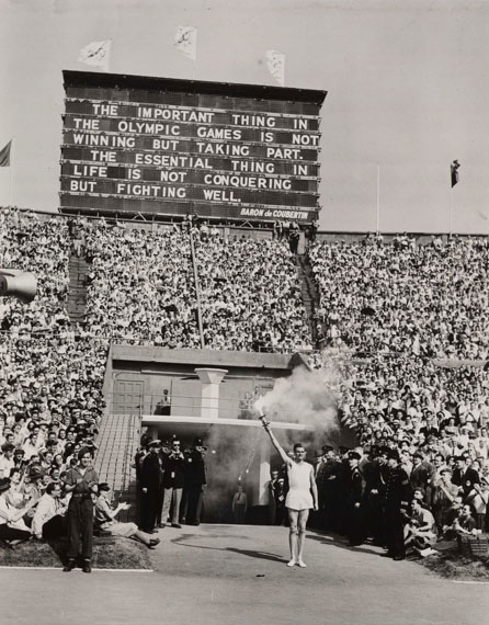 Torch bearer arrives at opening ceremony, 1948 Olympics, London