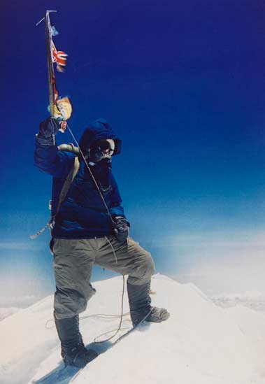 Tenzing Norgay photographed by Edmund Hillary on the summit of Mount Everest