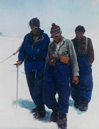 Edmund Hillary, with Alfred Gregory and Tom Bourdillon, at base camp following his successful ascent of Everest.