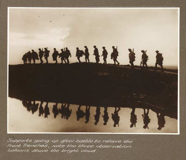 Picture of the silhouettes of World War One soldiers walking across the trenches