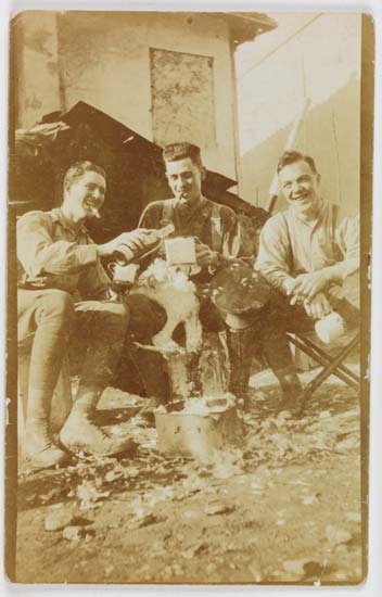 Picture of Three soldiers with their Christmas turkey, 1916