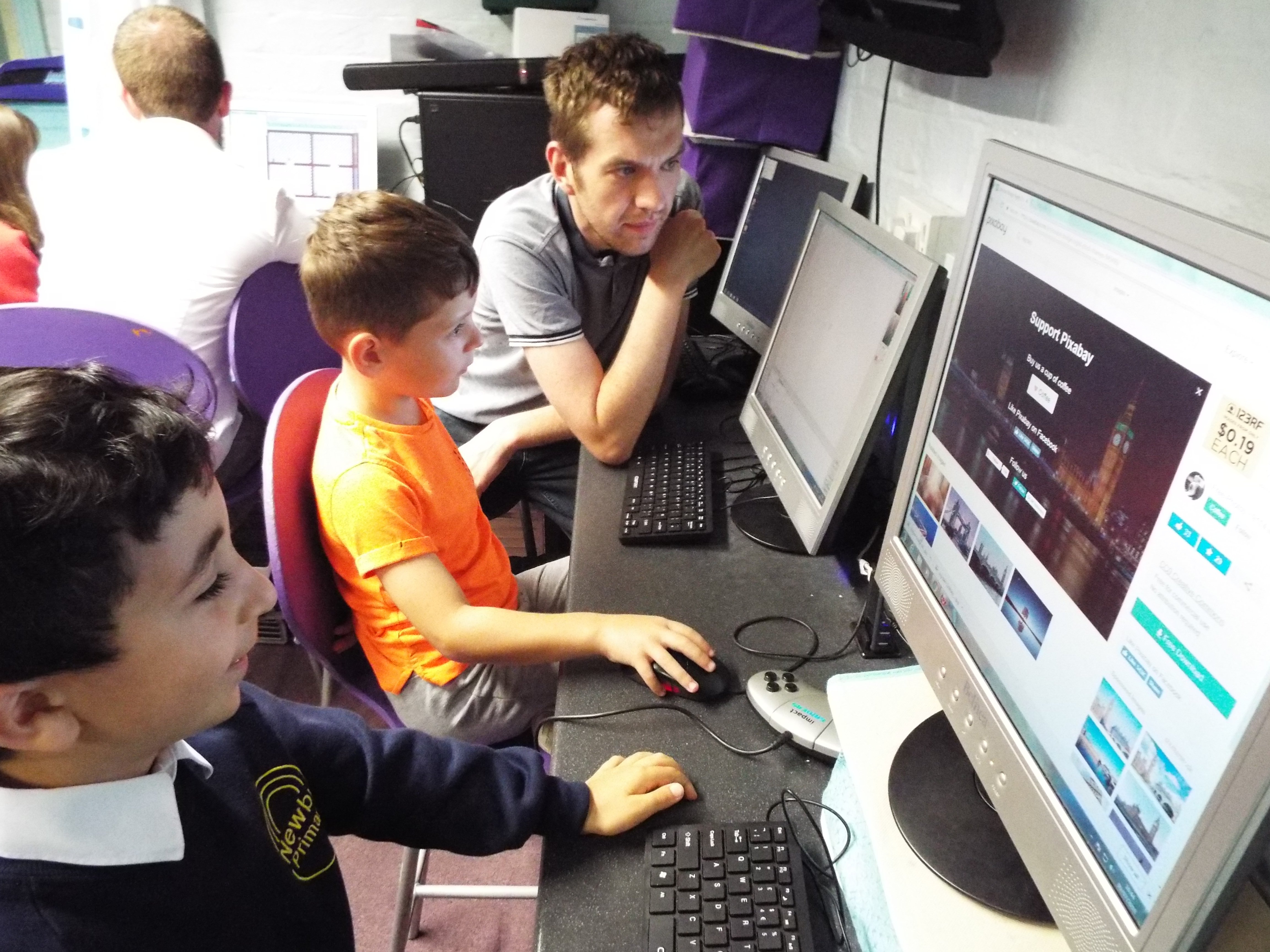 Adam Syrop working with children at Impact Gamers
