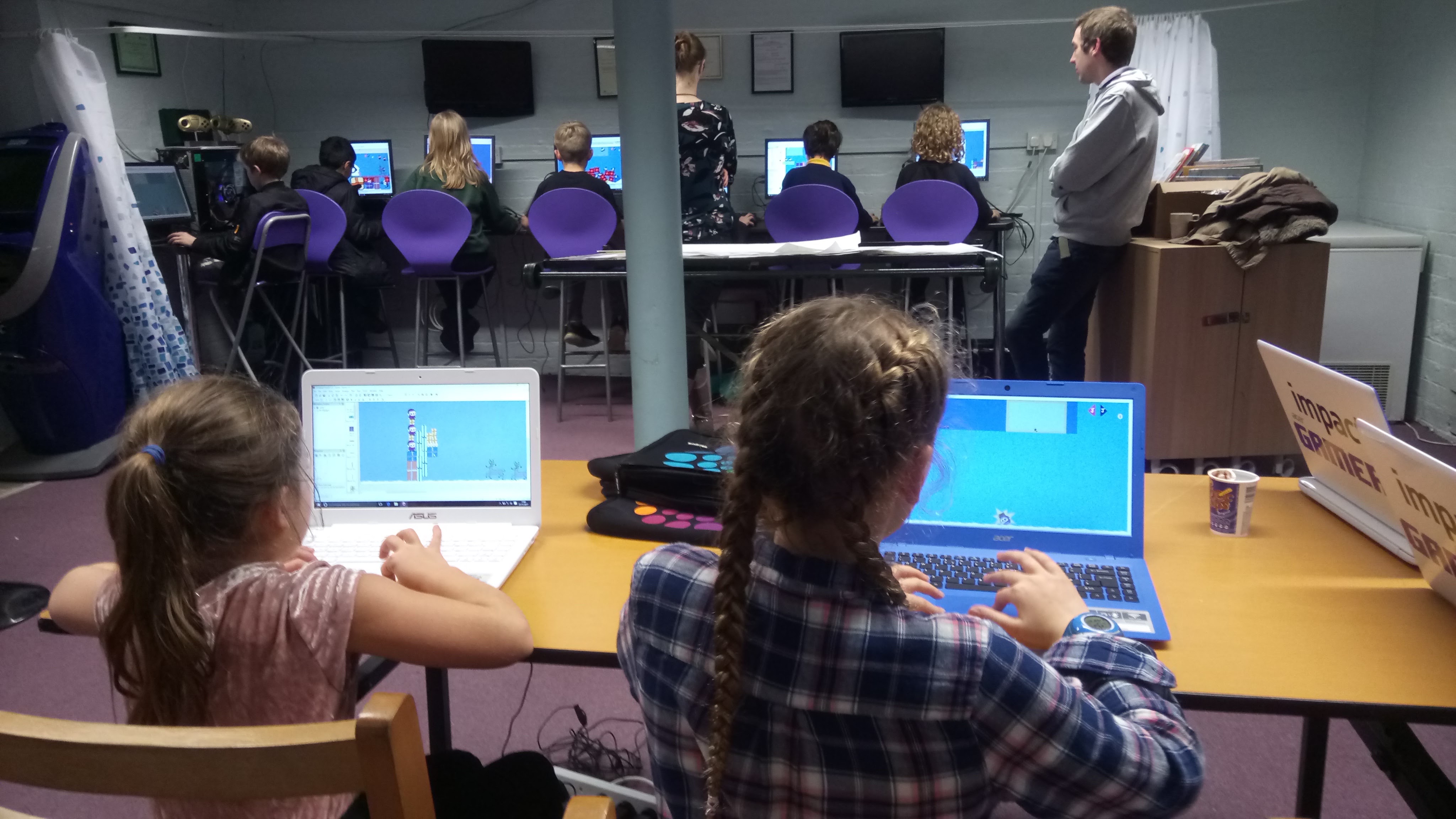 Children at a coding club at Impact Gamers