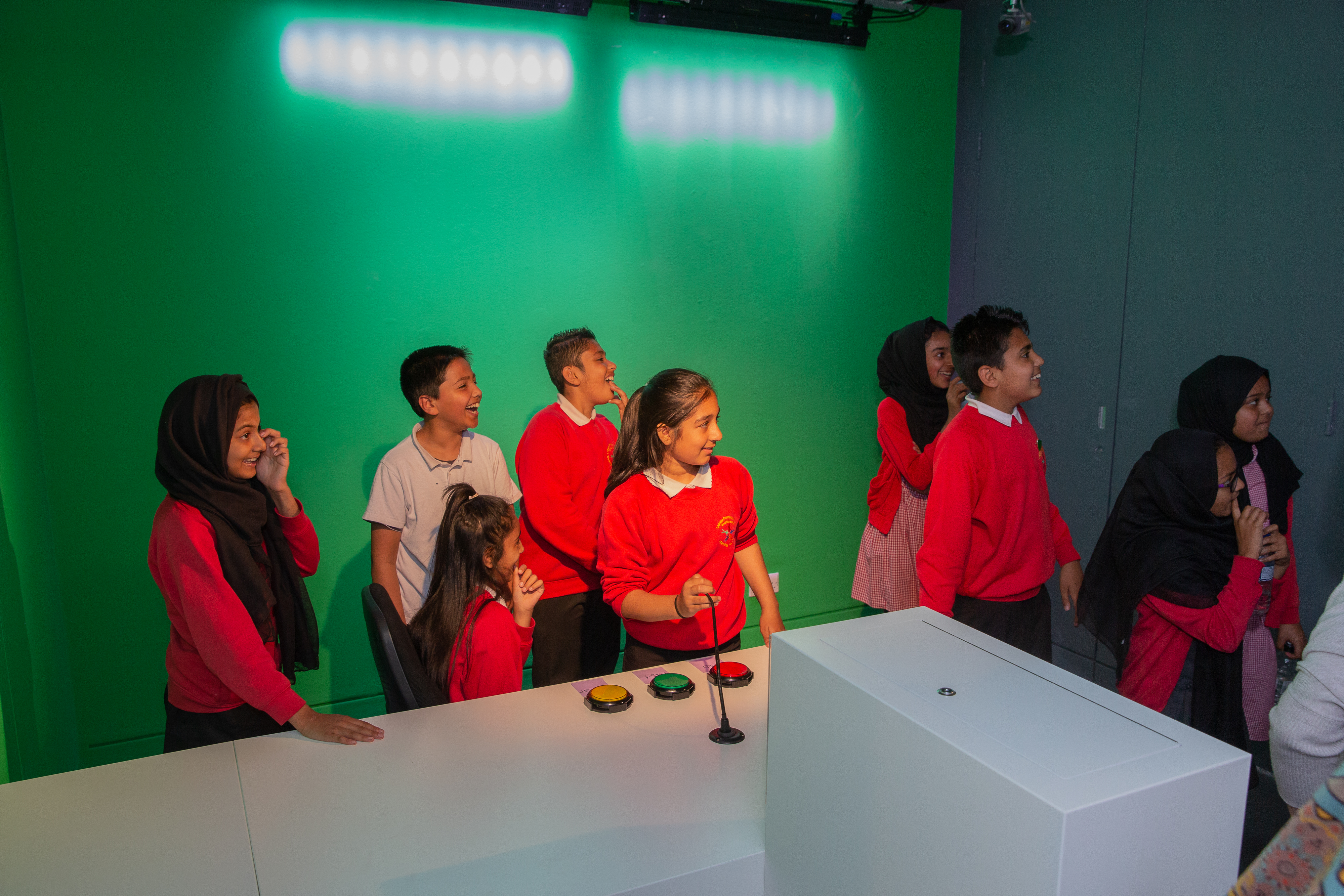 Students test their skills as sports presenters at the Action Replay exhibition