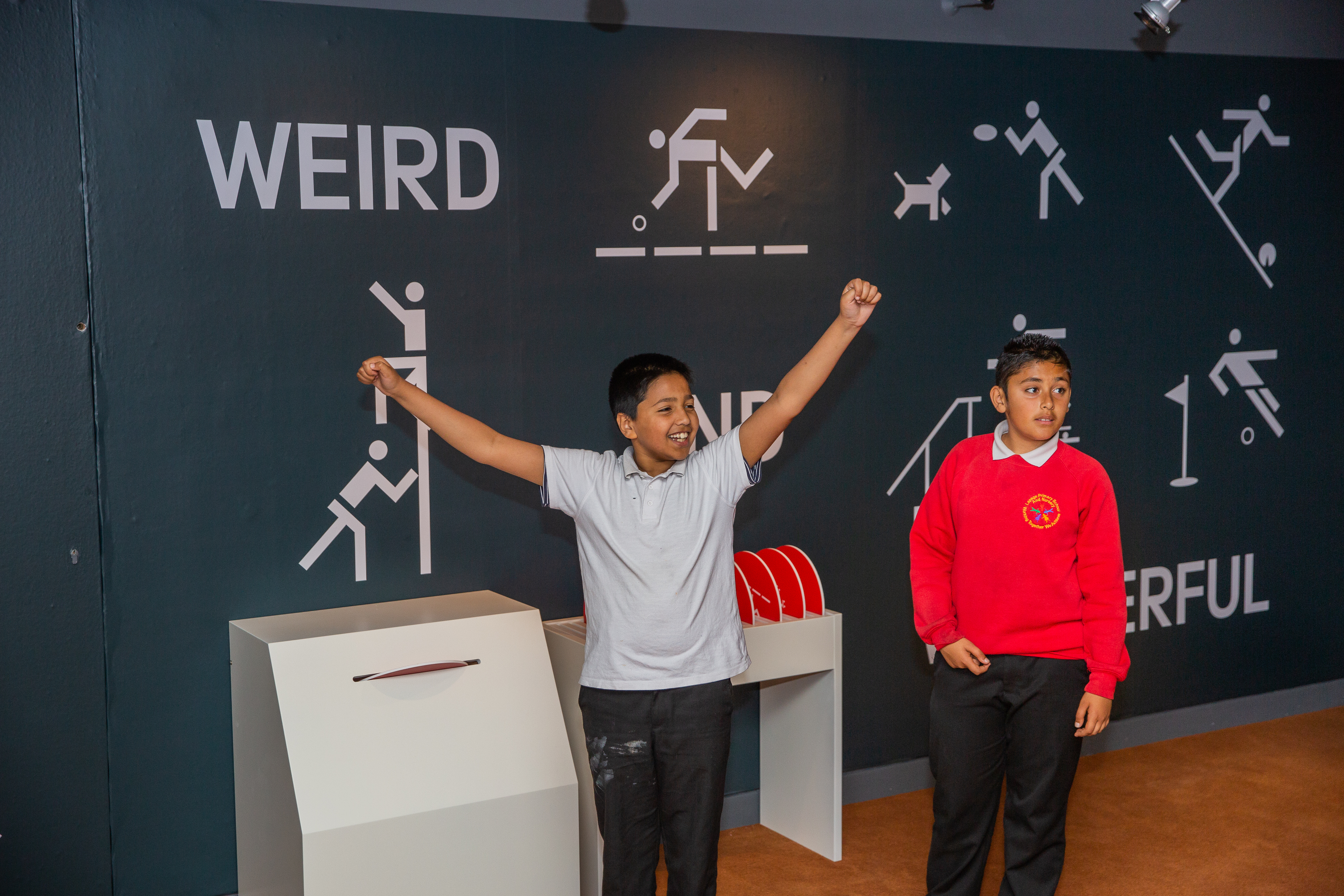 Students guess the weird and wonderful sports at the Action Replay exhibition