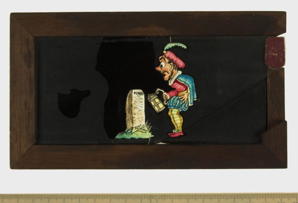 Magic lantern slide depicting jester-like figure