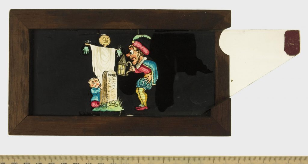 Magic lantern slide depicting jester-like figure