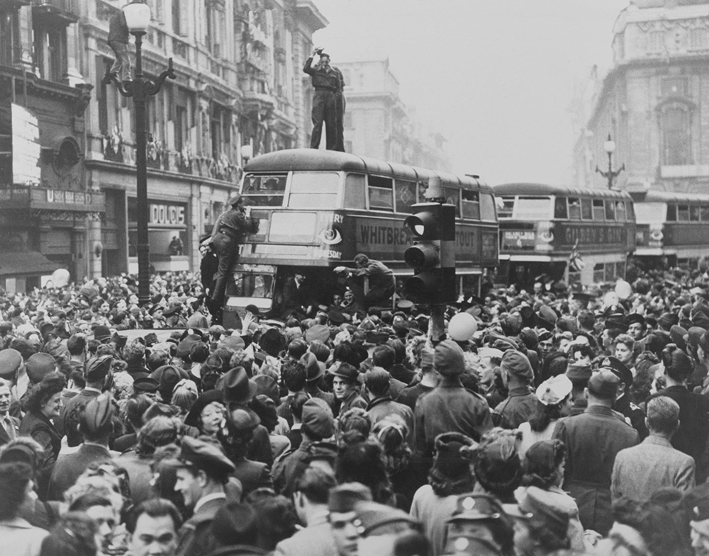 VE Day celebrations with crowds in the streets of Piccadilly, London