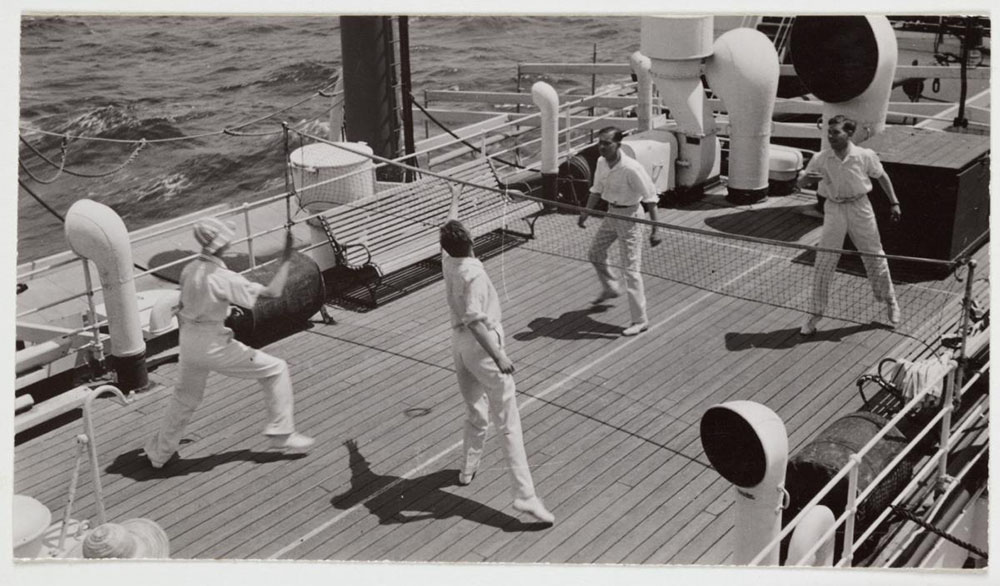 Men playing a game on the deck of a ship