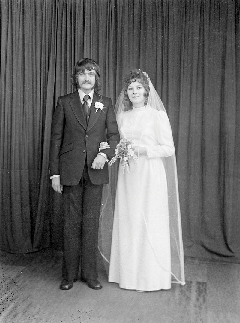 A couple on their wedding day, taken at Belle Vue Studio