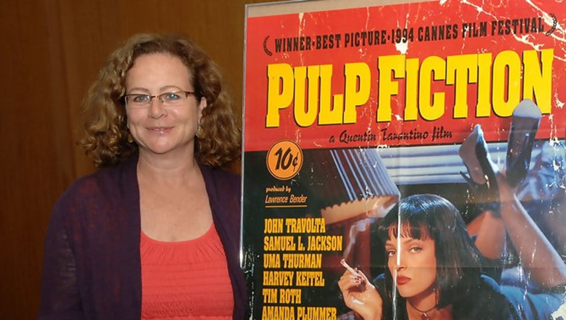 Sally Menke standing beside a Pulp Fiction poster