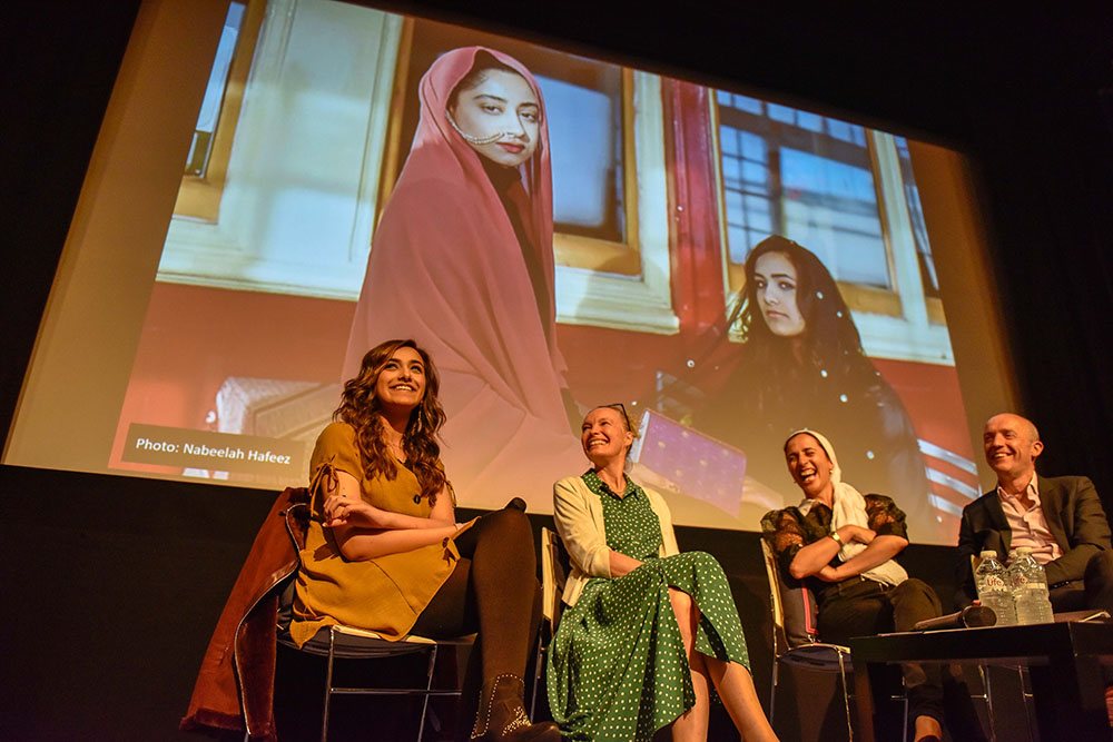 Discussion event on stage in Cubby Broccoli Cinema