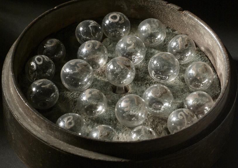 Glass balls in circular box