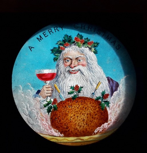 Magic lantern slide with illustration of Father Christmas holding glass of port