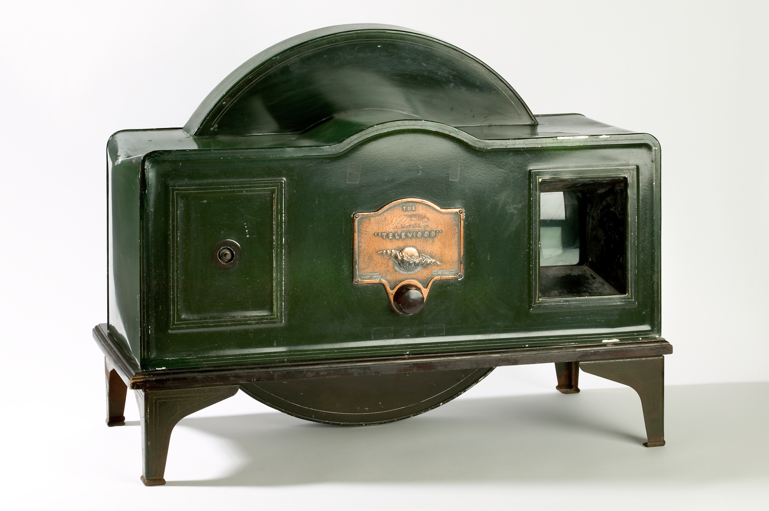 An early television set from the 1930s with a very small viewing screen 