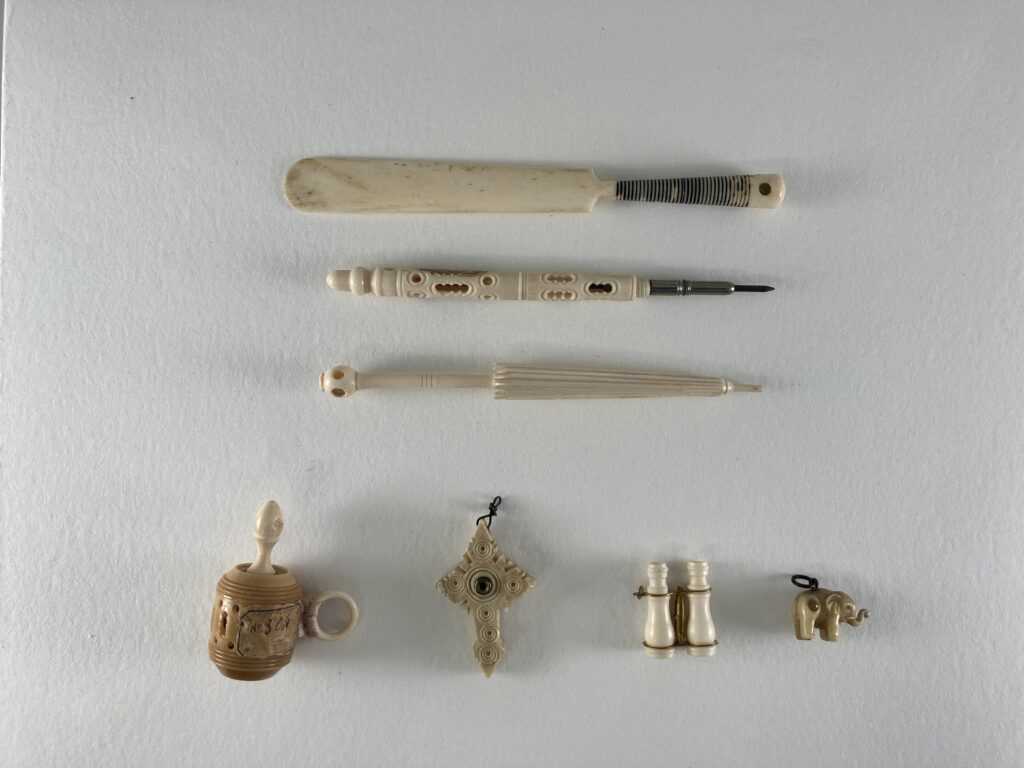 Ivory objects against a white background.