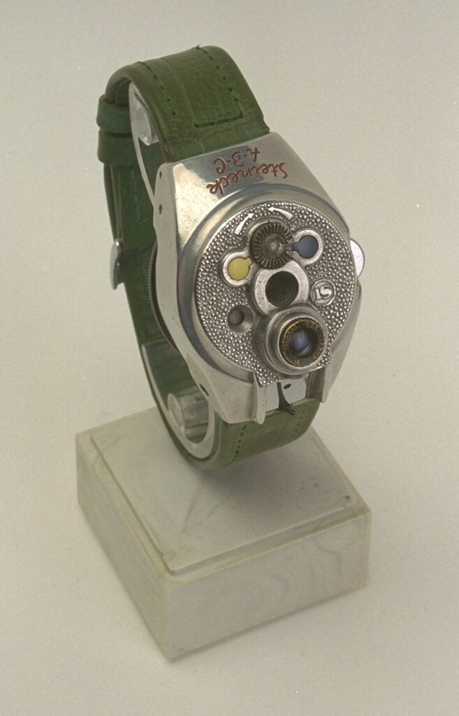 Wristwatch with camera lens on the face instead of clock hands.