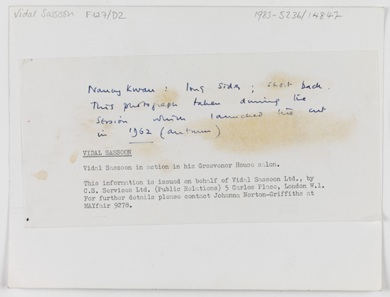 Vidal Sassoon in action in his Grosvenor House Studio - reverse of photograph