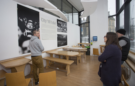 Sharon and her team installing the work in our picnic space.