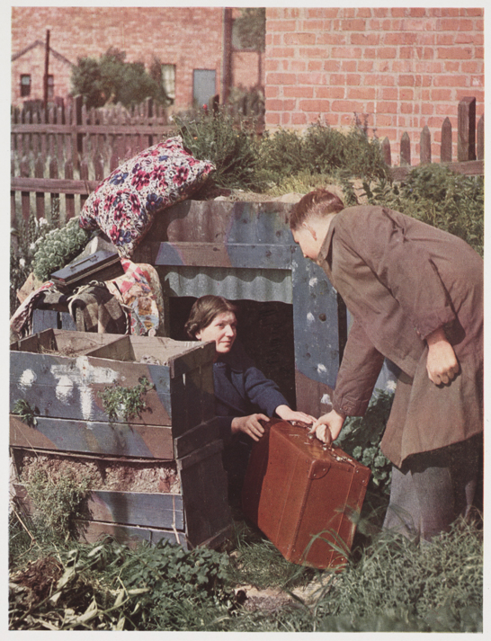 Man and woman by air raid shelter, c.1940, John Hinde © John Hinde Ltd.
