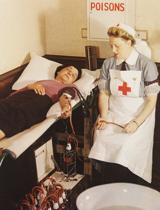 A blood donor and nurse at a civil defence first aid, 1944, John Hinde © National Media Museum, Bradford / SSPL