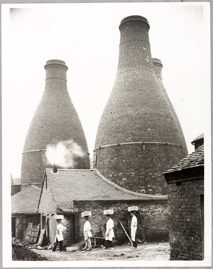 Carrying away ware after being fired.