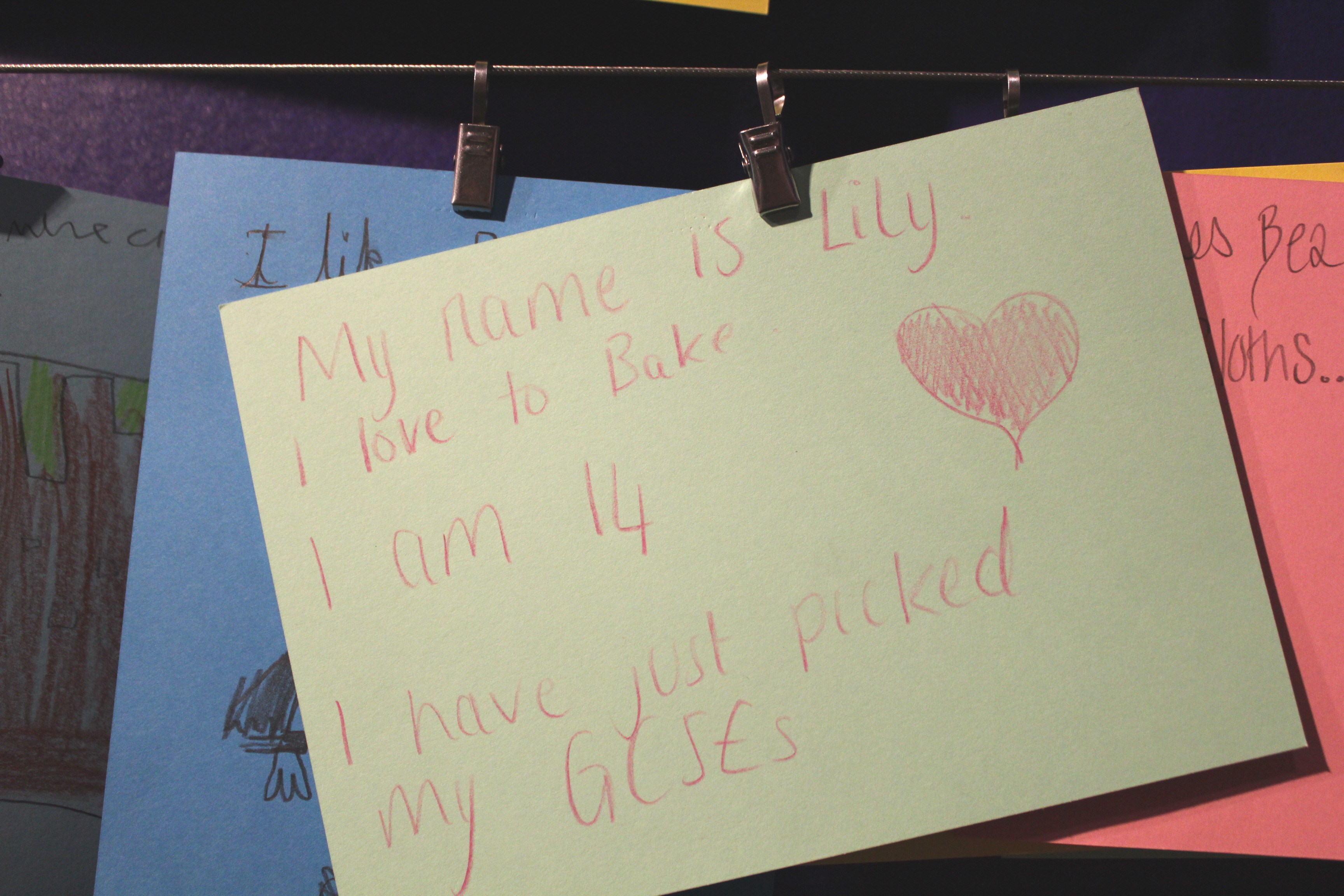 Handwritten card reading 