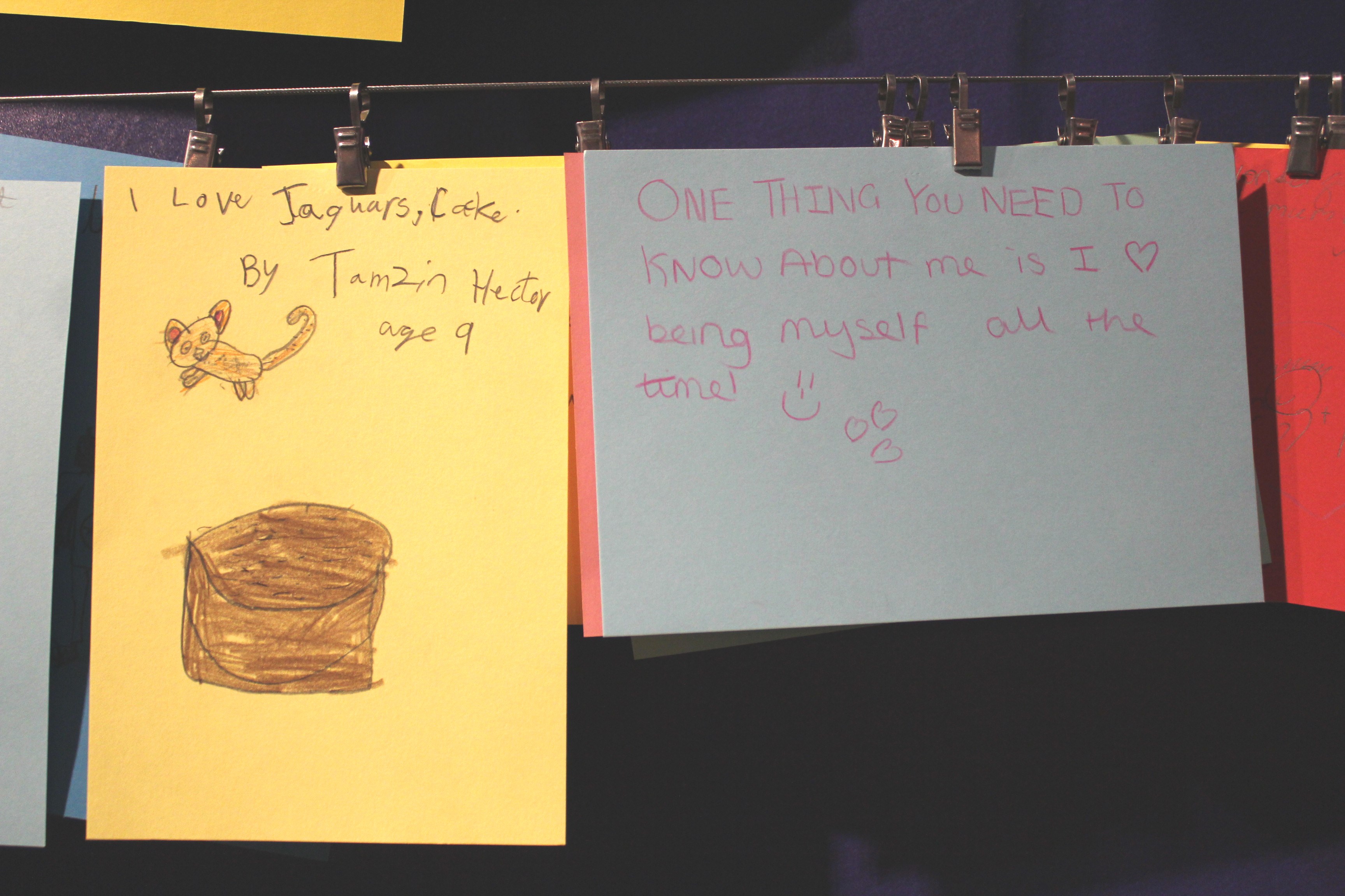 Cards written by children reading 