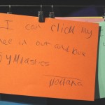 Card reading "I can click my knee in and out and love gymnastics"