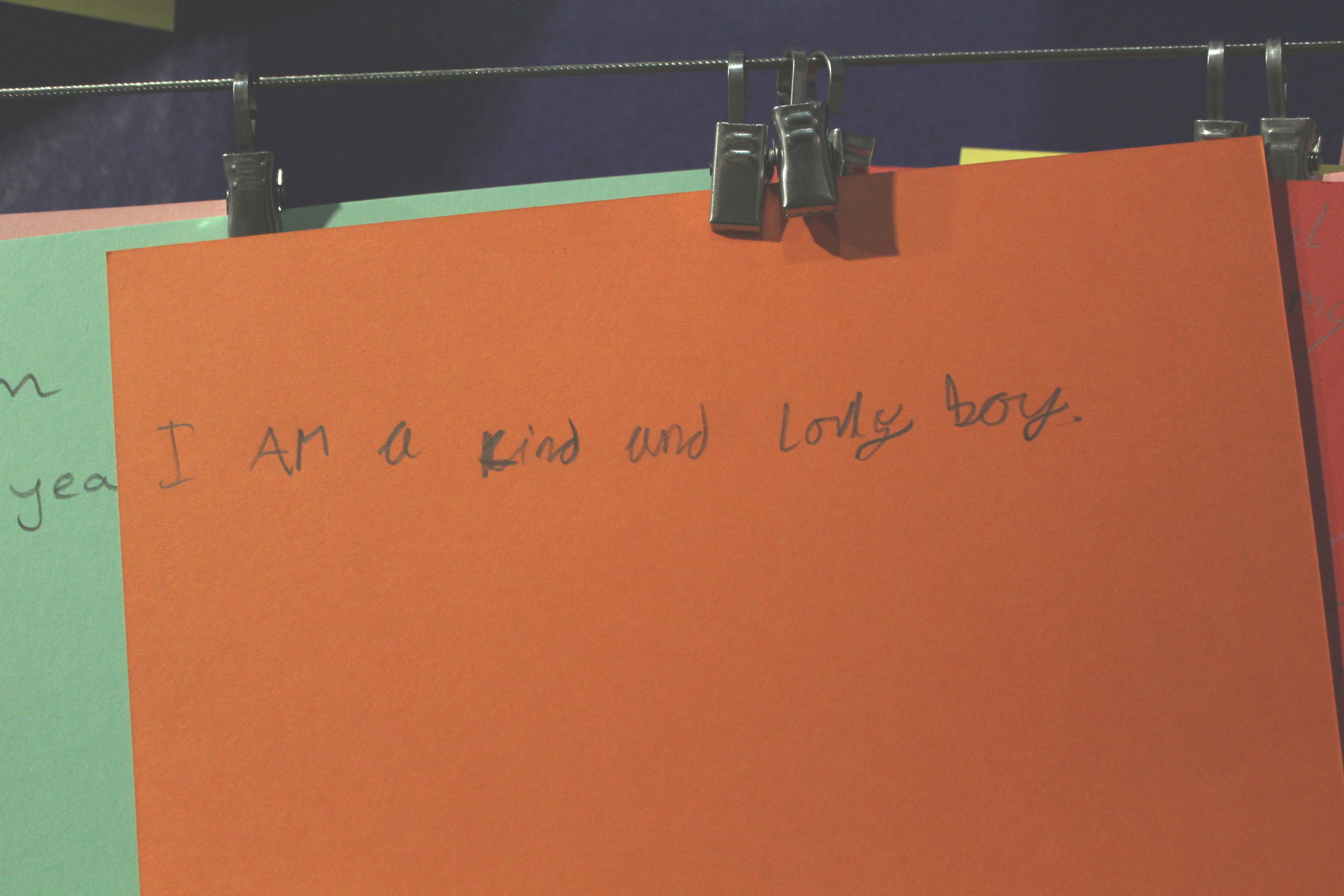 Card in child's handwriting reading 