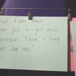 Card reading "That I am more than just a girl with depression... I have a family that love me!"