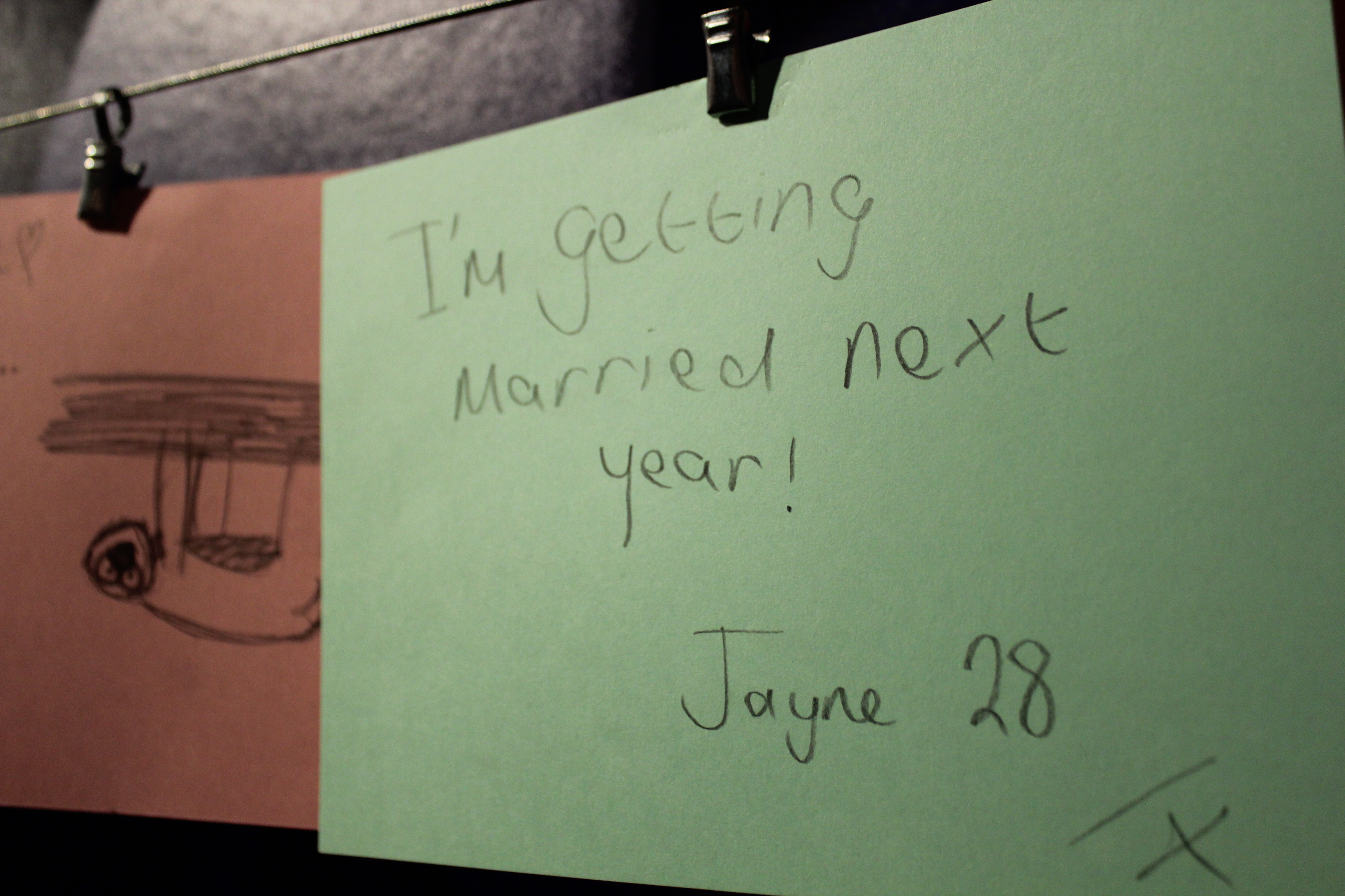 Handwritten card reading 