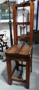 Criminal photographic posing chair c.1880