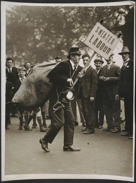 Man with 'sweated labour' placard at civil service demonstration, c. 1939. Daily Herald Archive / National Science and Media Museum Collection / SSPL