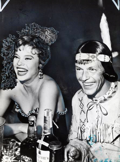 Frank Sinatra photographed at a costume ball