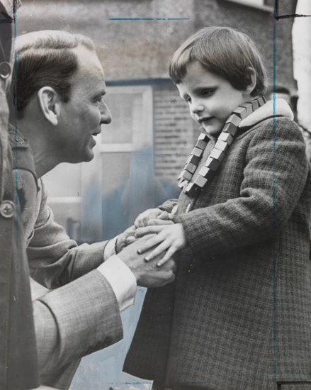 Photograph of Sinatra visiting home for children with visual impairements