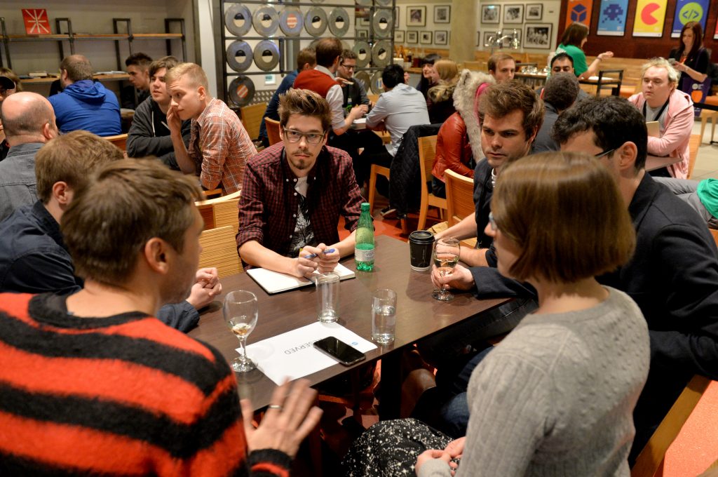 Guests and students talk games at the Meet the Developers networking event