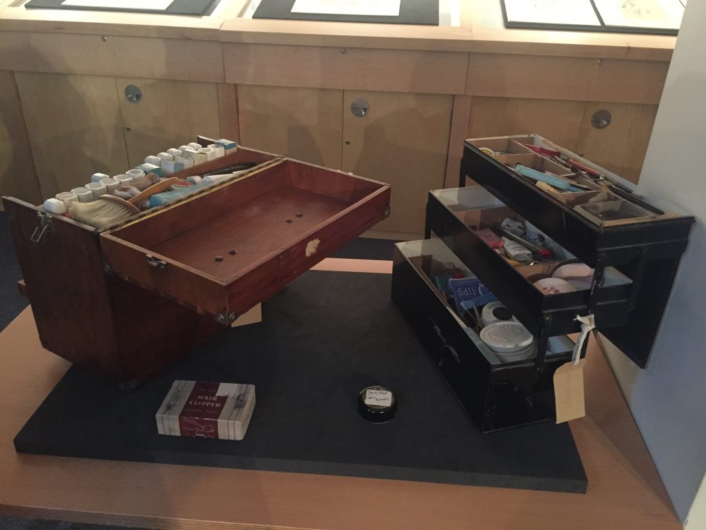 Visitors inspect items from the Hammer collection in Insight: Collections & Research Centre